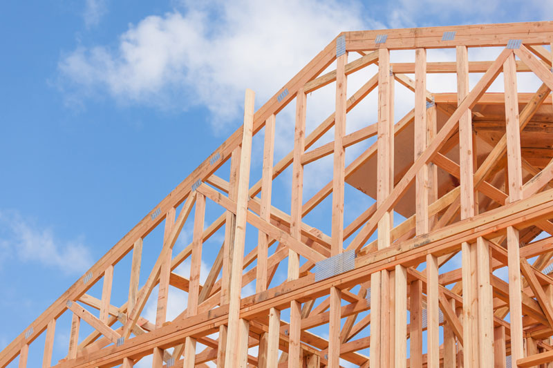 Wood Home Framing Abstract At Construction Site.